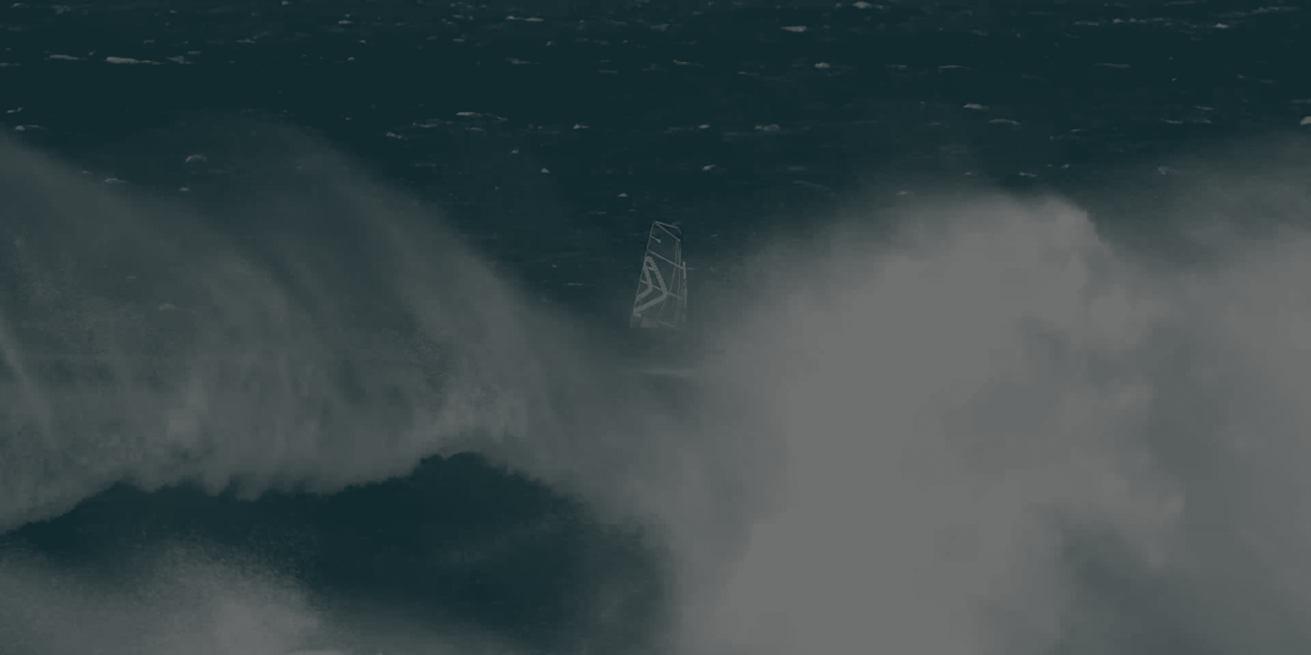 Windsurfer alone in massive, gnarly surf.-00-00-01-396 Michael George Westra sailing barrack point